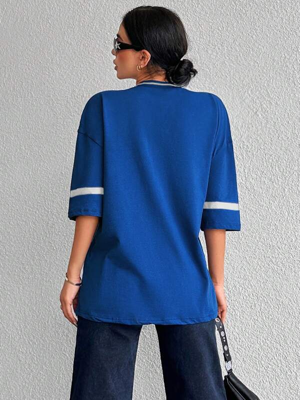 Raffaella Shirt | Oversized Varsity Shirt met ‘89’-Print en Sportieve V-Hals