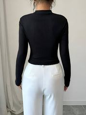 Bay Top | Dames Top met hoge kraag, rozenapplicatie en asymmetrische zoom