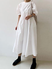 Alia | Losse jurk met pofmouwen