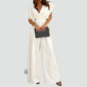 Dames Jumpsuit met Overslaghals, Wijde Pijpen en Kapmouwen - Zwart/Beige/Wit