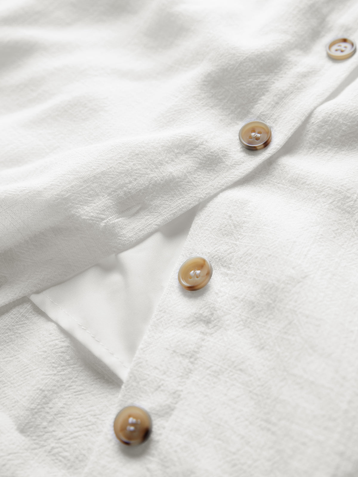 Dames linnen mini jurk met knopen en mouwloos design - Isabella Fiora