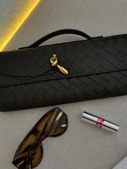 Geweven vegan leren handtas dames, luxe clutch met knoopsluiting | Bella Norvina