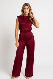 Giovanna dames jumpsuit – satijnlook met open rug & wijde pijpen