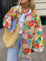 NANCE - Lichtgewicht zomerjas met bloemenprint en Uitlopende mouwen