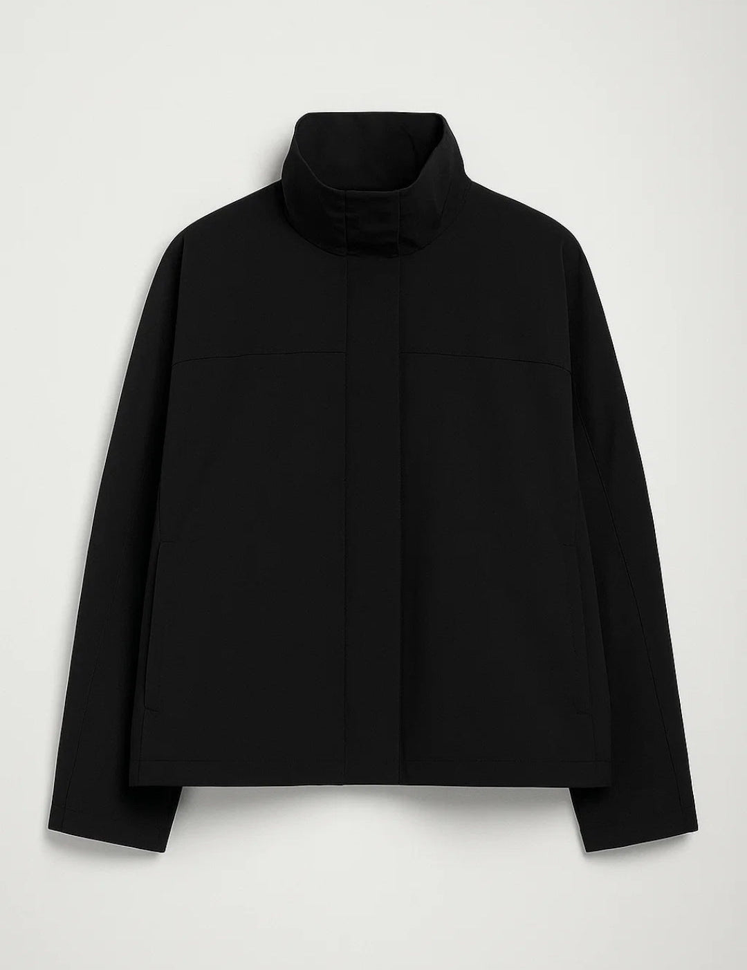 Damesjas_met_Opstaande_Kraag_Minimalistisch_Design_Lichtgewicht_en_Comfortabel1.jpg