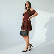 Tweedelige Dames Set Off-Shoulder Top en Mini Rok met Knopen - Off-White / Bordeaux - Maelen