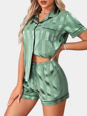 Allegra satijnen pyjamaset dames – luxe tropische print met bies