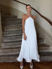 Amélie Jurk | Geplisseerde Halterjurk met Elegante Pasvorm en Luchtige Stof