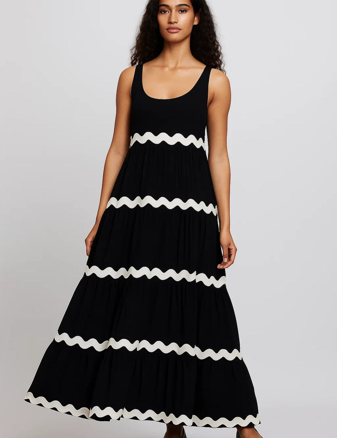 Mouwloze_Maxi_Jurk_Golvend_Strependetail_Speelse_Zomerstijl1_7666838e-aa39-44f6-add1-1a52bf4a572f.jpg