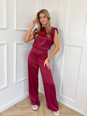 Giovanna dames jumpsuit – satijnlook met open rug & wijde pijpen
