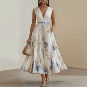 Bloemen Maxi Jurk Dames met Plissé Rok, V-hals en Lange Mouw - Aurora Bellini