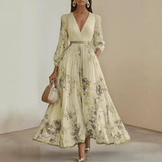 Bloemen Maxi Jurk Dames met Plissé Rok, V-hals en Lange Mouw - Aurora Bellini
