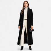 Bianca Dames lange zwarte mantel – elegante maxi coat met kraag en knoopsluiting
