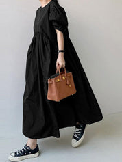 Alia | Losse jurk met pofmouwen