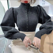 Valeria Coltrui | Elegante Coltrui met Pofmouwen en Subtiele Knoopsluiting