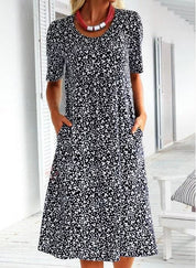 Alisha™ Bloemenjurk | Vrouwelijke Midi-Jurk met Ronde Hals, Vloeiende Pasvorm en Zijzakken