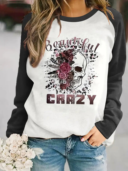 Luna Sweatshirt | Edgy Statement Sweater met Schedelprint en Romantische Accenten
