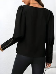 Bodi Blouse | Elegante Blouse met Pofmouwen en Metallic Ritssluiting