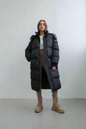 Martina Oversized dames winterjas lang – warme zwarte puffer met capuchon
