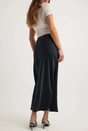 Alessia Satijnen midi-rok dames – Elegante hoge taille rok met glanzende afwerking