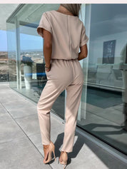 Luciana Jumpsuit | Elegante V-Hals Damesjumpsuit met Strikdetail en Luchtige Pasvorm
